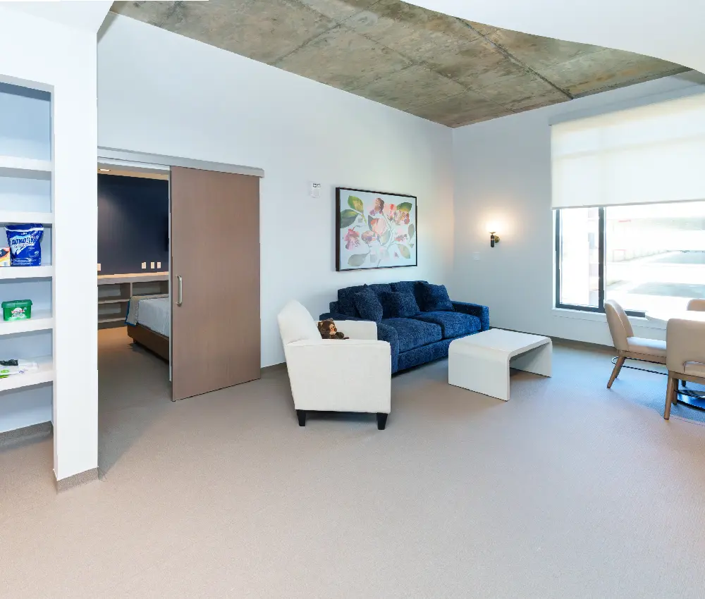 living room with couch and chairs