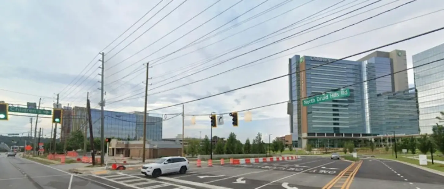 road with hospital building