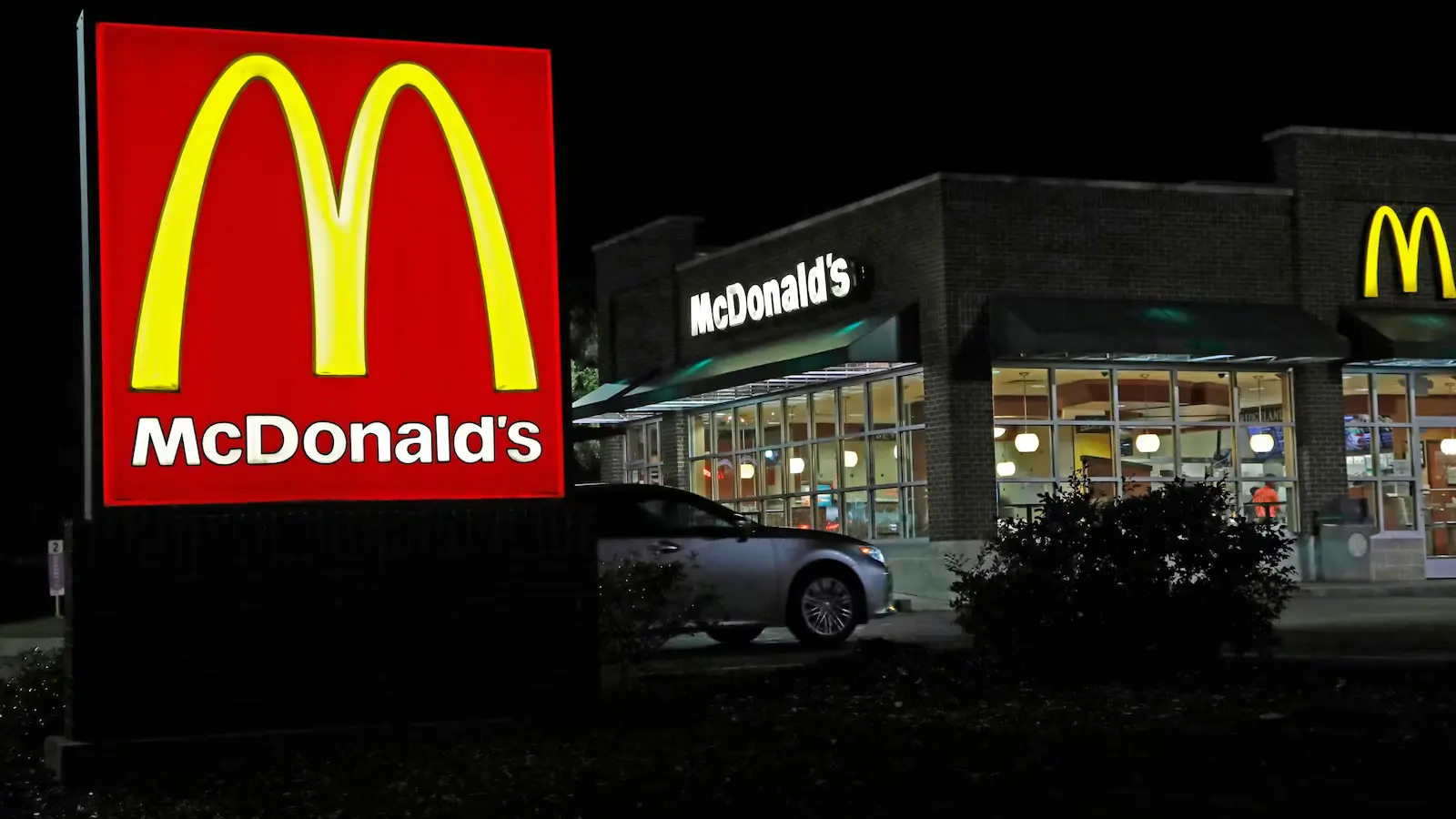McDonalds sign in front of building