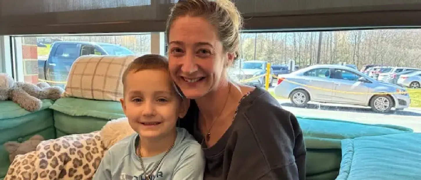 woman and boy smiling