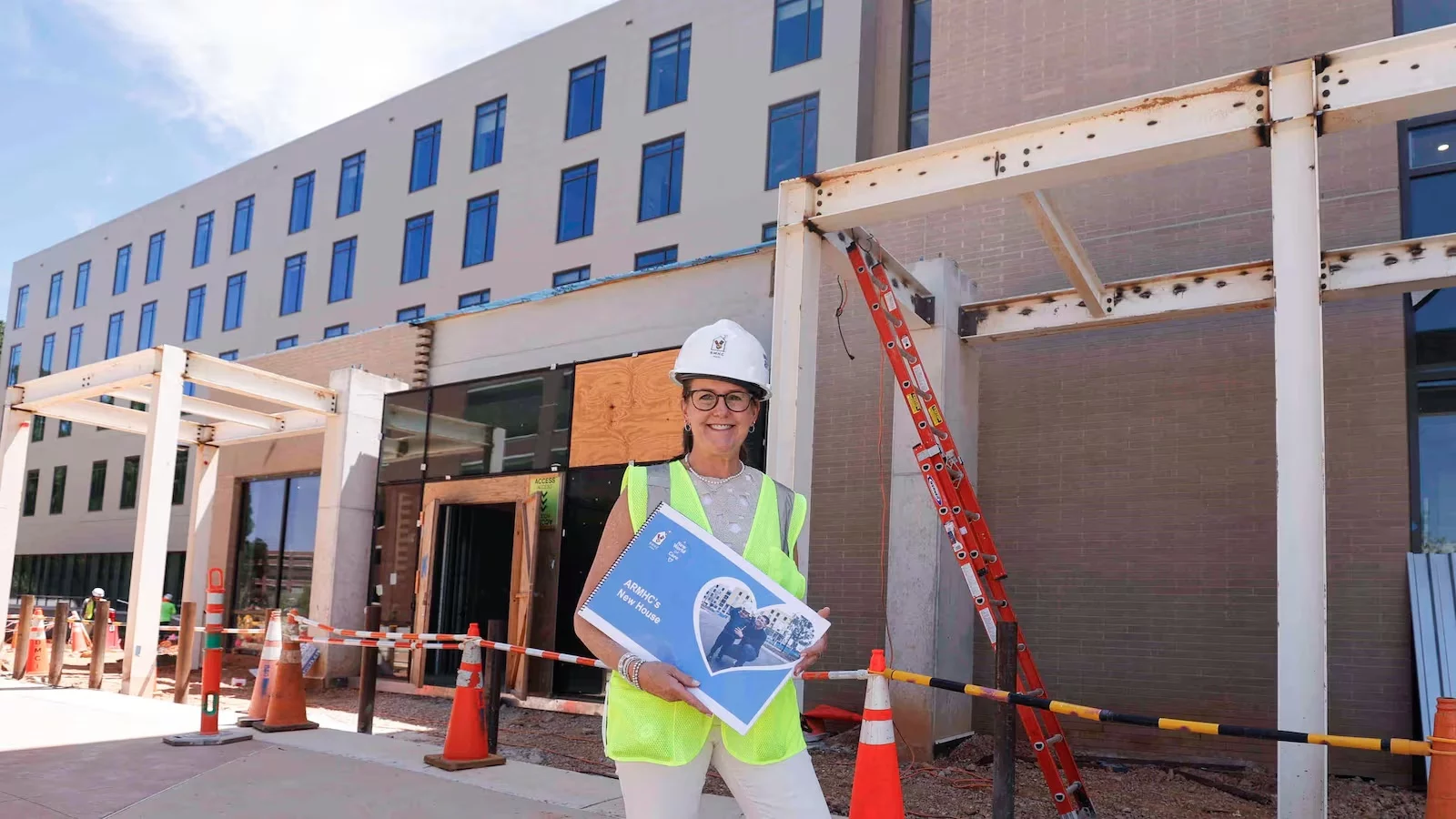 Tracey Atwater, president and CEO of Atlanta Ronald McDonald House Charities, stands in front of the construction site of a new Ronald McDonald House