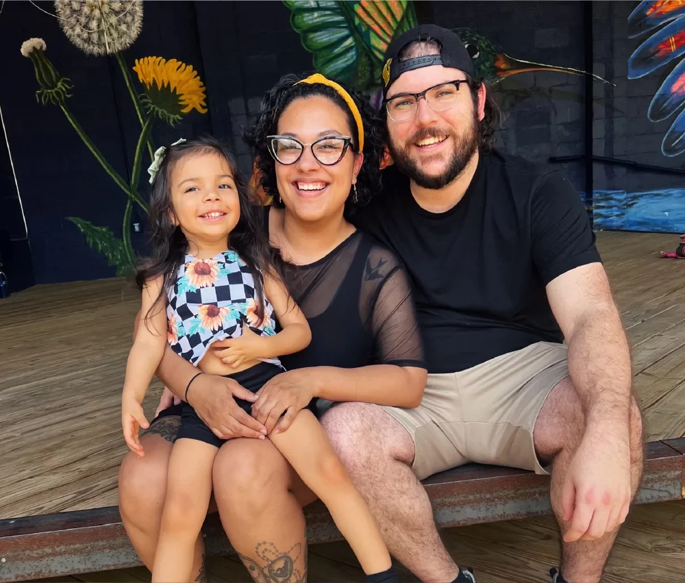 parents sitting with child