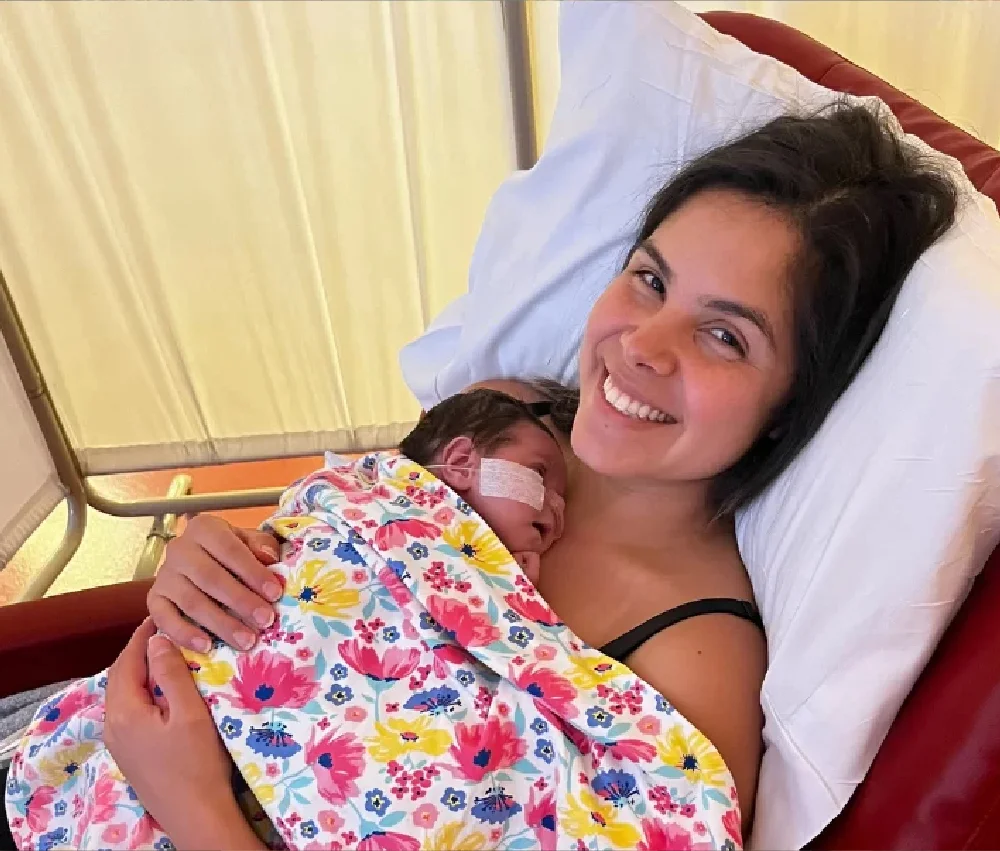 mother holding baby in hospital