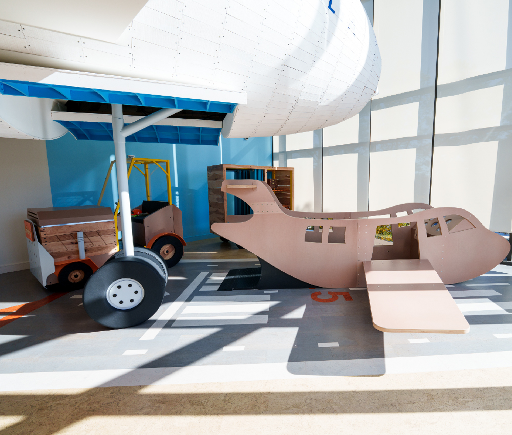 Indoor playscape with plane