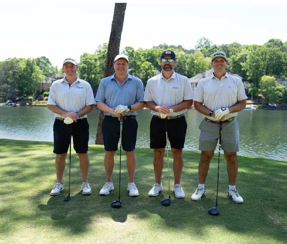 men standing on golf course
