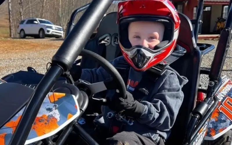 boy in go cart