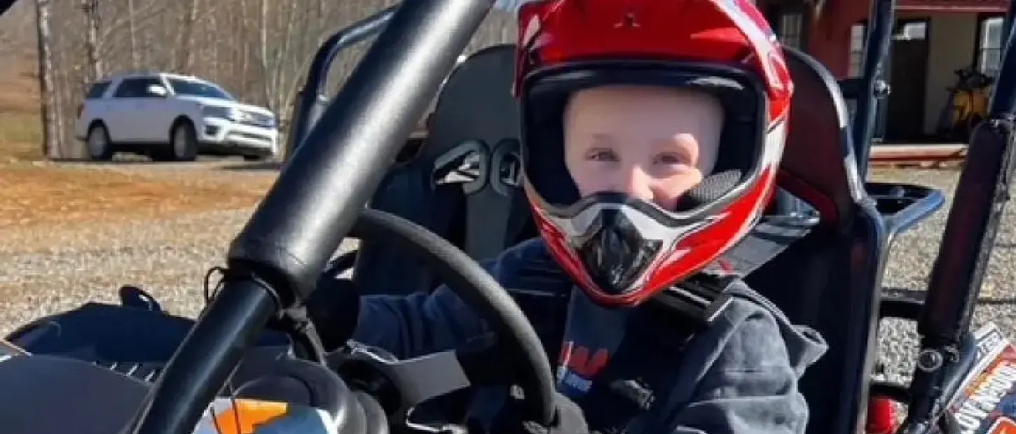 boy in go cart