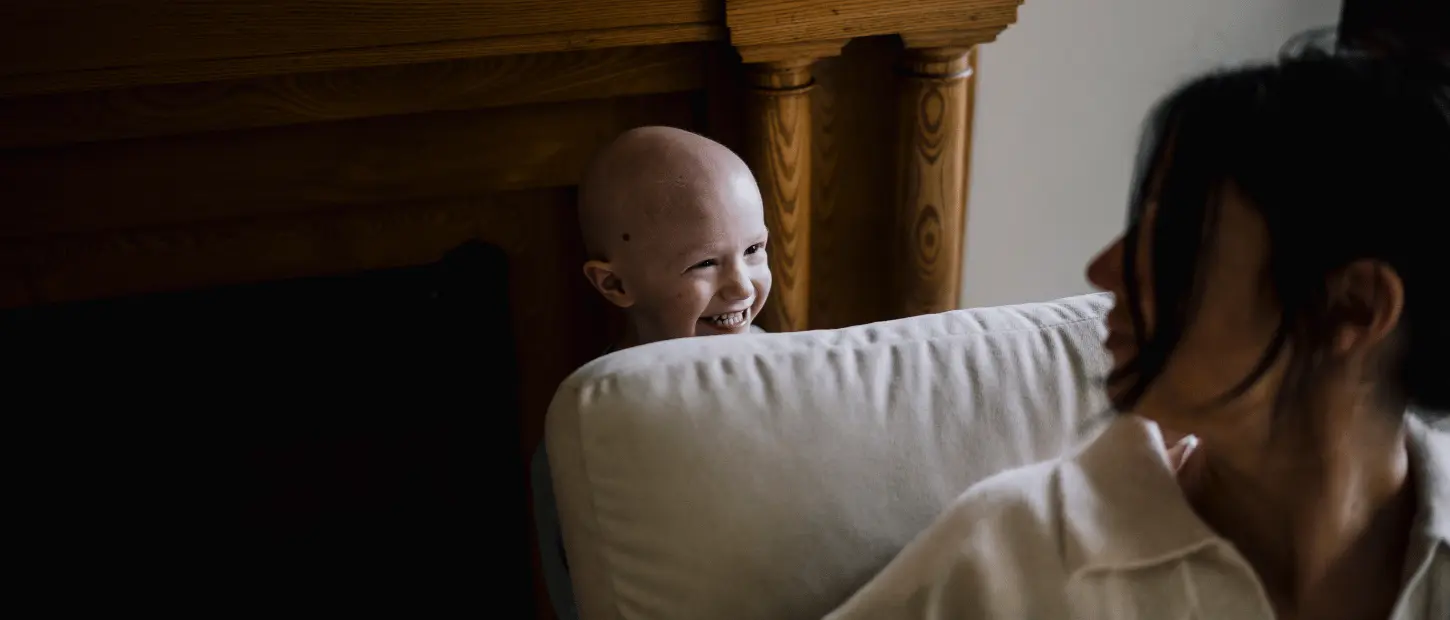boy smiling at woman