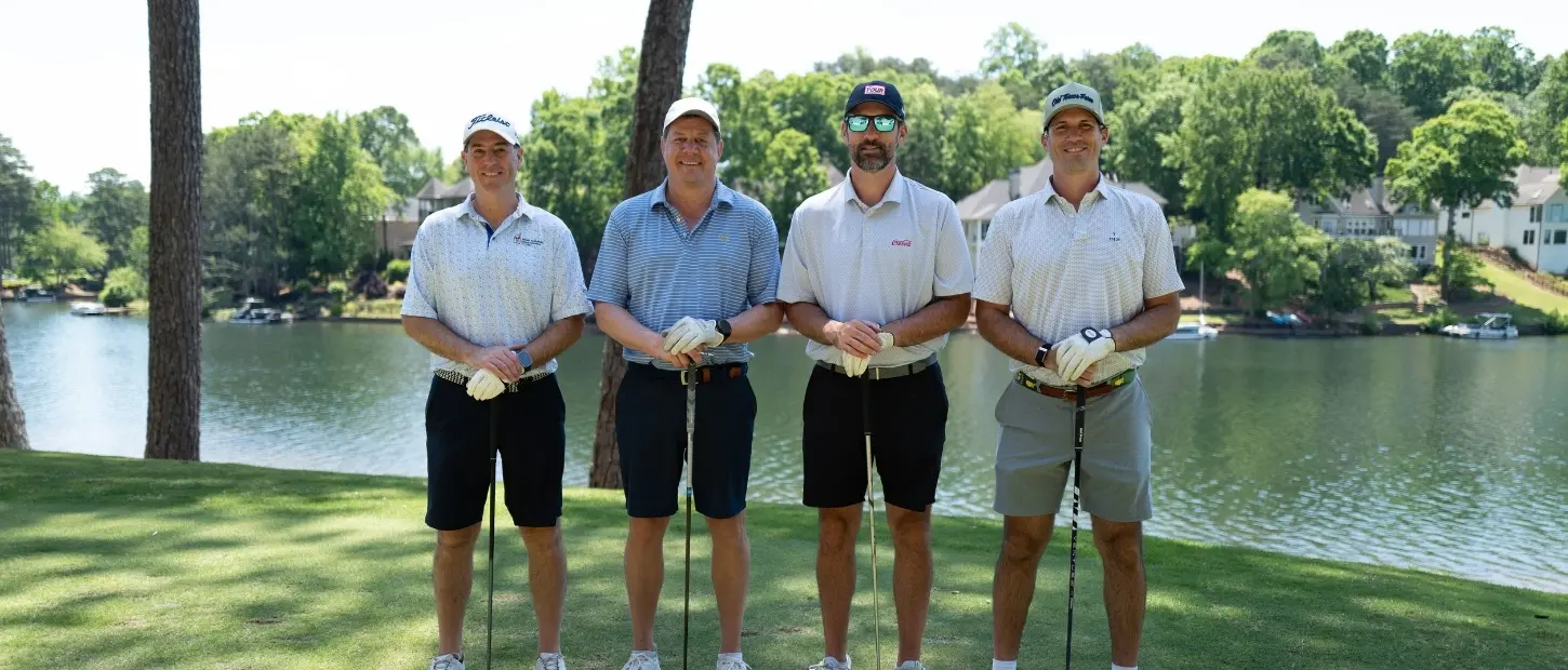 men standing on golf course